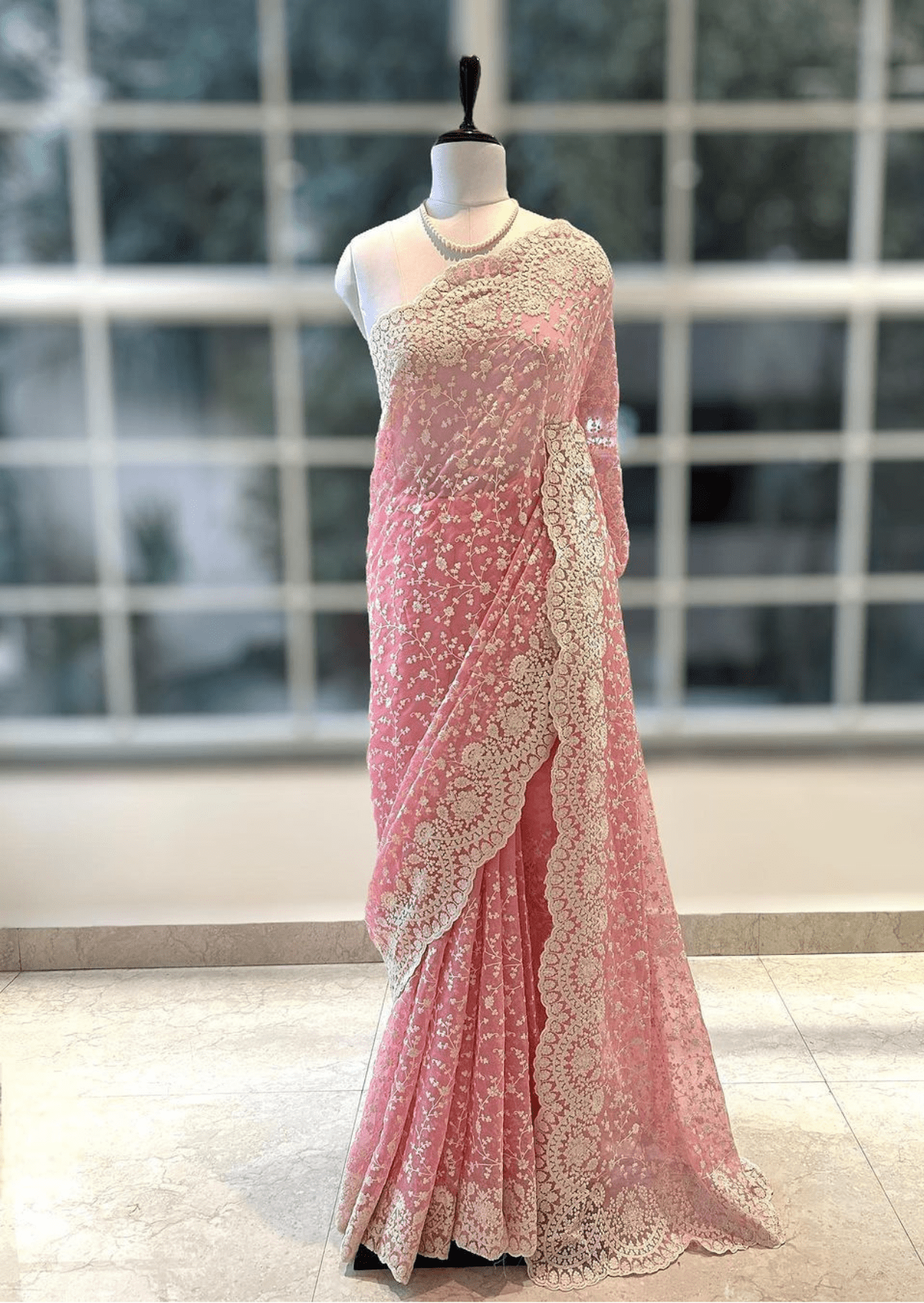 Blush Elegance Pink Embroidered Net Saree